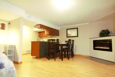 Ground-level, no stairs, fully renovated, and furnished—this bachelor apartment offers the perfect b...