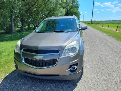 One owner vehicle, Mocha brown color, cloth seats, air-conditioning, AM/FM/CD stereo, back-up camera...