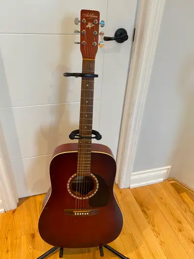 Acoustic guitar and stand, View more