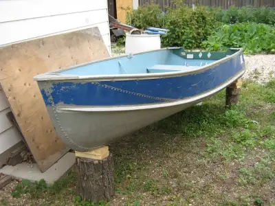 Great old 12' boat with a 9.9 Chrysler 2 Stroke motor ,used to hunt and fish ,but alas,old age and h...