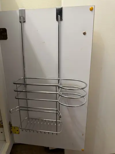 Keeps hair tools organized Hangs on cabinet door (inside or outside, your preference) Can hold hair...