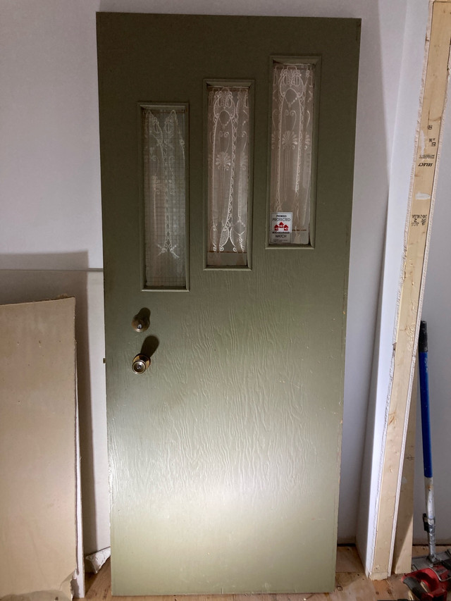 34” solid wood front door. in Windows, Doors & Trim in Fredericton