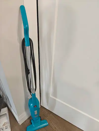 Keep your floors clean with this Bissell Featherweight stick vacuum! This lightweight vacuum is perf...