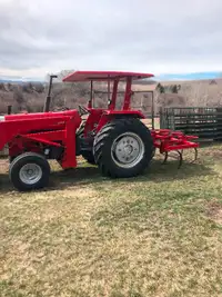 Massey 283 tractor with grapple/bucket