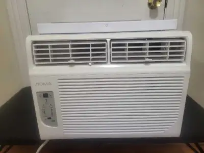 Noma 10,000 btu window air conditioner. Was over 400$ new. Works very well. No side pull outs but ca...