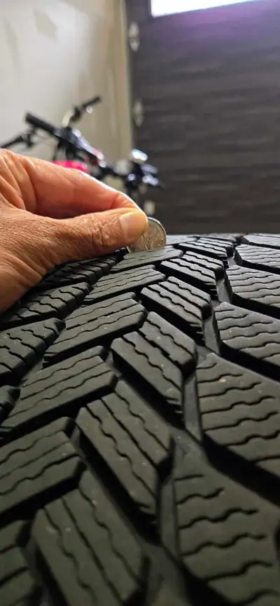 4 Winter tires. Still holds grip. Selling because it doesn't fit my new car.