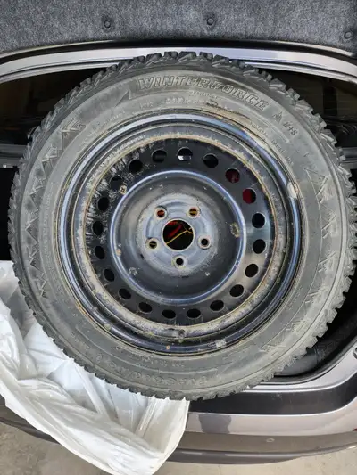 A set of 4 used winter tires on rims Firestone Winterforce - 235/55R17 99S 5/32" tire tread remainin...