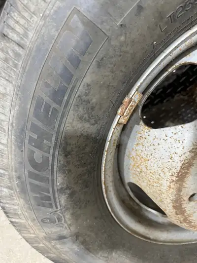Spare tire and rim it’s new has never been installed, asking 100 bucks pickup close to shell lake Sk...