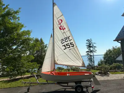 CL11 sailboat. Totally refurbished and repainted. New hatches. Custom made cover. I bought the boat...