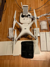 DJI Phantom 4 Drone with 2 Batteries and Accessories Like New