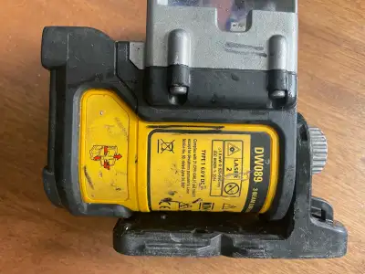 This is a used DeWalt DW089 3-Beam Line Laser Level, great for ensuring accuracy in various construc...