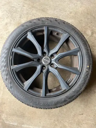 Upgrade your ride with this set of four pre-owned RTX wheels wrapped in 245/45ZR18 Blackhawk Street-...