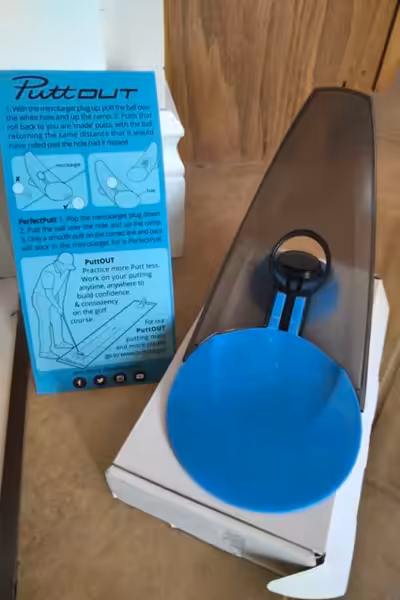 Putt-Out Putting Trainer. Helps you practice weight and distance of putts. $10 ---------------------...