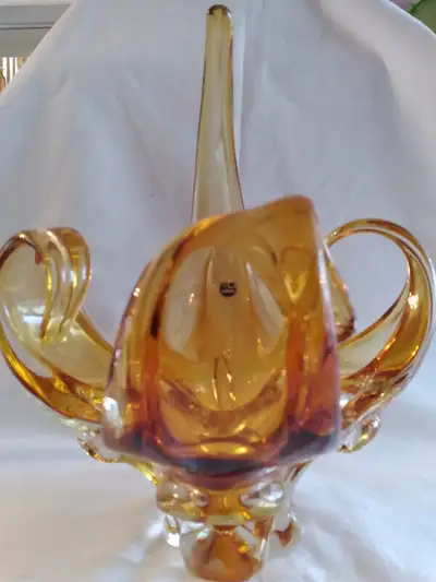 a beautiful canadian made art glass by chalet in light amber color it is in perfect condition it has...