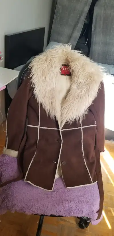 SUEDE JACKET WITH A FUR AROUND THE NECK, View more