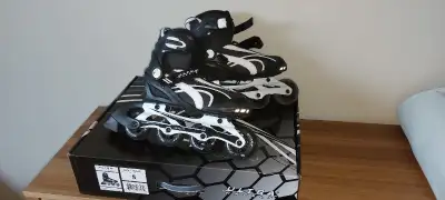 Patins à roues alignées taille 5 homme. Bon état. Men's Inline skates size 5. Good condition.