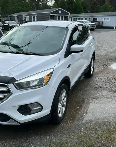 Selling my 2017 ford escape se, bought new tires in February Don’t know what it need for cert Transm...