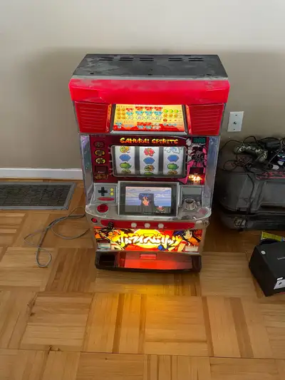 Samurai Spirits Pachislot Machine - Works Great (No Key). This pachislot machine runs on tokens. It...