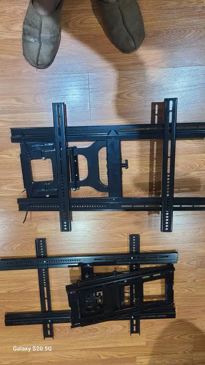 3 heavy duty swinging tv brackets . $125. Contact 647-739/8428