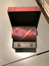 Brand new patterned red tie and cuffling set!