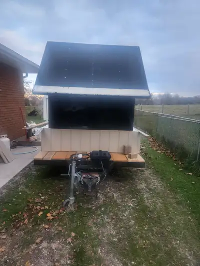 12 ft deck Heavy Torsion axle Electric brakes Enclosed area is 7ft inside Rear door 76" height, 56"...