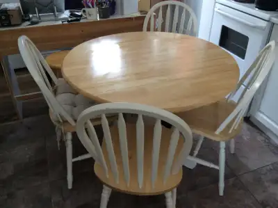 Table with chairs, wooden counter stool, bed, bookshelf, kitchen, View more