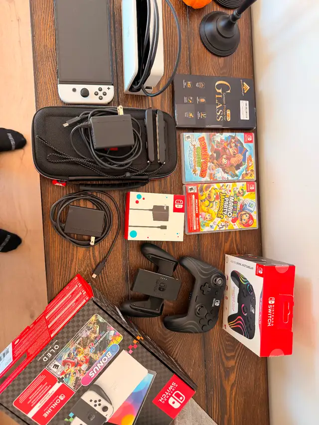Nintendo Switch OLED Bundle – 2 Games, Pro Controller & Accessor ...