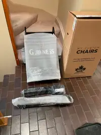 Brand new Guinness branded resin folding Adirondack Chair