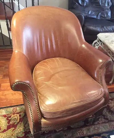 Price: $200 each or $300 for both Description: High-end genuine leather armchairs with nailhead trim...