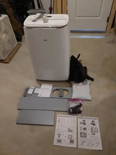 Air conditioner like new used twice, View more