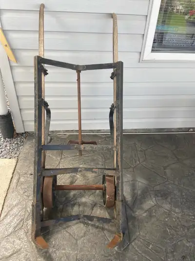 Cast iron antique barrel cart Looking for a fun, functional antique?! This barrel cart was used for...