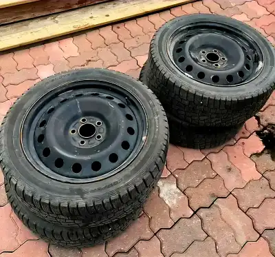 These Cooper Discoverer True North winter tires in size 245/45R18 come mounted on steel rims Tire Si...