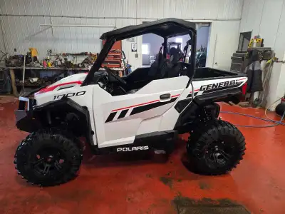 2023 Polaris General Sport, has roof,bumper, 1/2 winshield, upgraded 14" wheels,450 miles, like new,...