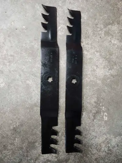 Two 21 inch John Deere compatible mulching mower blades. Set for a 42 inch garden riding mower or us...