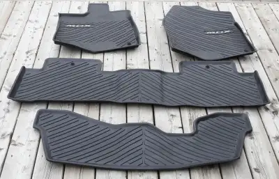 Up for sale is a complete Original Geniune OEM Acura all-weather heavy-duty rubber floor mat set. It...