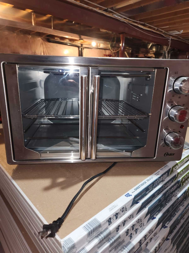 Oster toaster oven in Toasters & Toaster Ovens in Kitchener / Waterloo