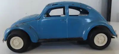 This is an original vintage TONKA toy Volkswagen Beetle. The blue Beetle is made from tin metal. The...
