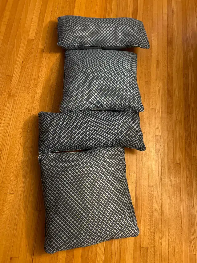 Four throw pillows64840213240834121