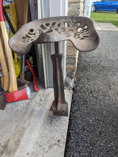 Old farm implement seat , View more