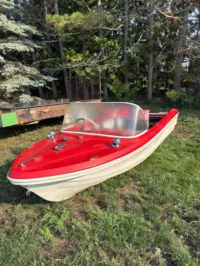 No trailer no motor. No big damage so should float. Could use new seats. About 13 feet long 5 feet w...