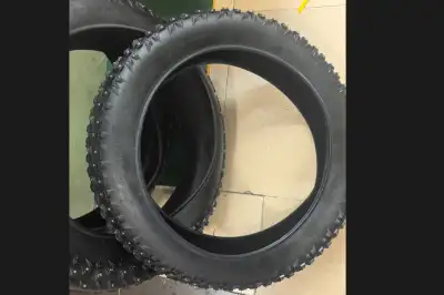 NEW 20" x 4" STUDDED FAT BIKE TIRES., View more