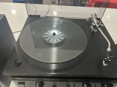 Selling a used Rega Planar 2 turntable, known for its quality sound and minimalist design. Upgraded...