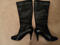 High heeled leather boots - new