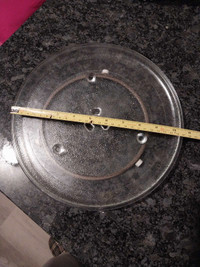 Microwave oven glass plate with roll and Rolling. 