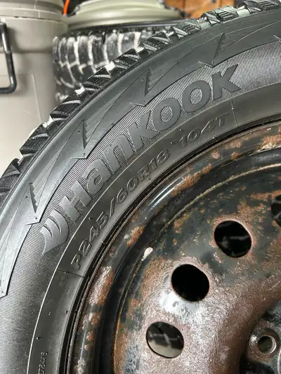 Hankook Pike RW11 snow tires. P245/60R18. Mounted on steel rims. Rims are 18x8. Bolt pattern 5x114.3...