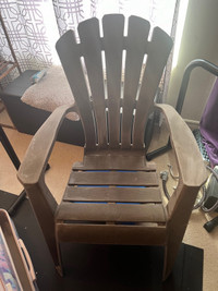 2 brown plastic muskoka/ Adirondack chairs