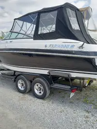 Four Winds boat with trailer