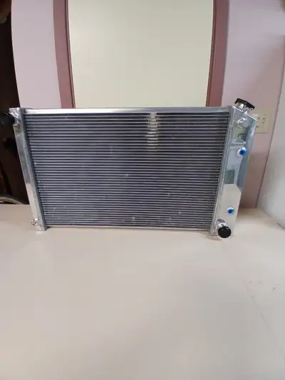 Champion radiator. 2 row. Fits most 77 to 88 chevy, Gm. Never been installed. New. $425 or best offe...
