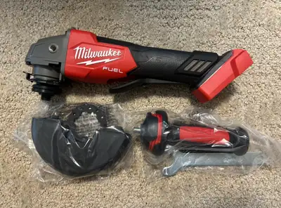 brand new Milwaukee m18 fuel 4 1/2 & 5” grinder with paddle swit, View more