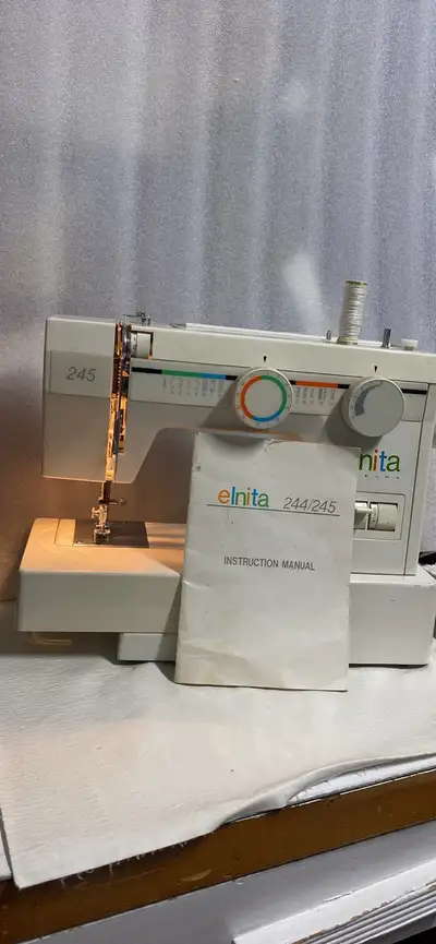 For sale - three sewing machines in good working condition priced as follows: 1. Elnita sewing machi...